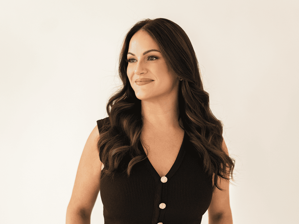 Ashley Sweet, Realtor Estate Sales Representative, smiling professional headshot